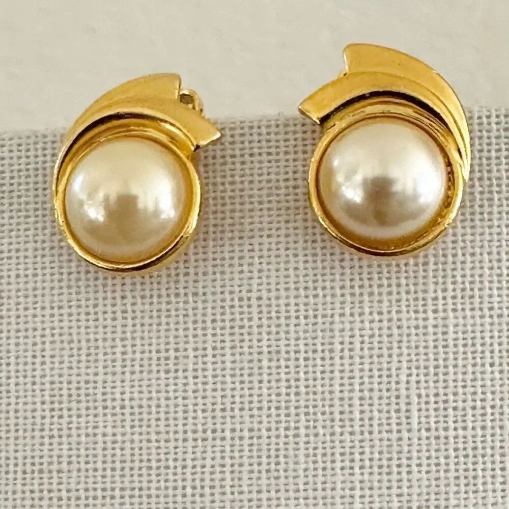 Gold tone faux pearl clip on earrings